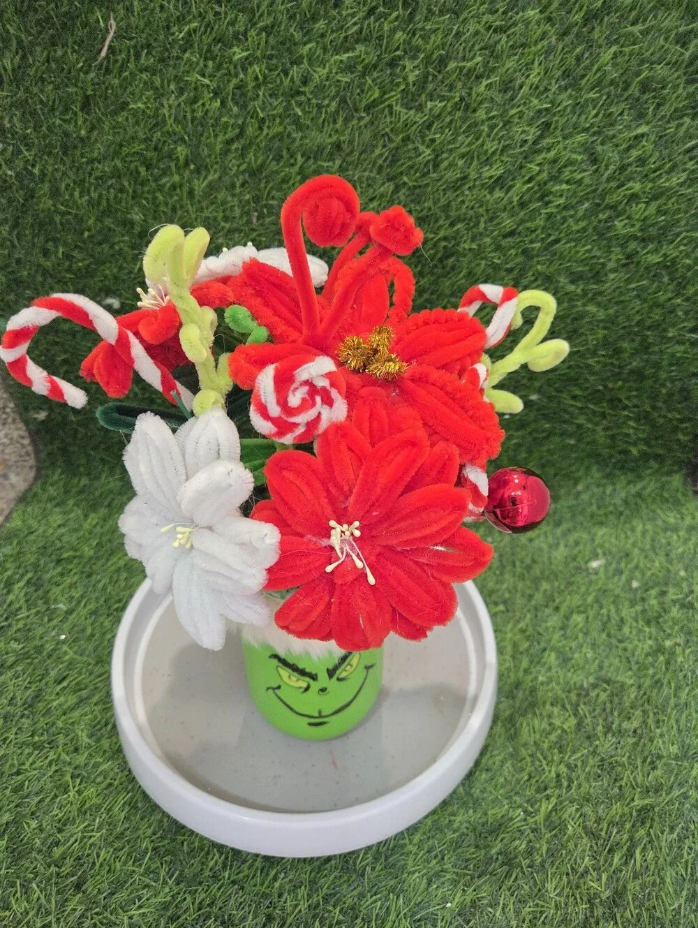 2pc Hand Made Floral Display With Grinch Hand